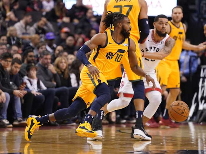Mike Conley (10) leads the Jazz down the floor against the Toronto Raptors